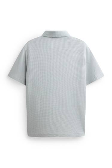 Uomo - Polo - regular fit - tessuto tramato - grigio