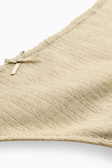 Femmes - String en pointelle - beige