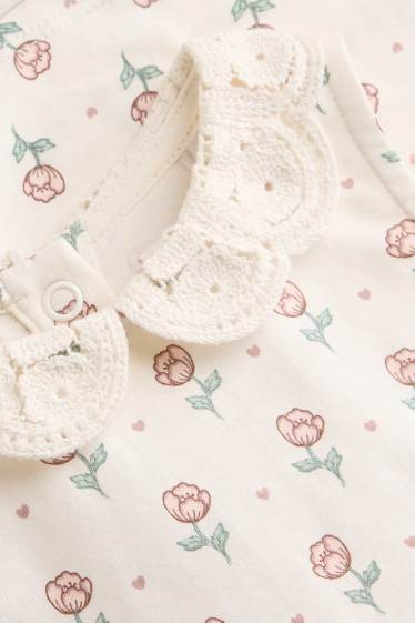 Baby: meisjes - Bloemetje - babyjurk - wit