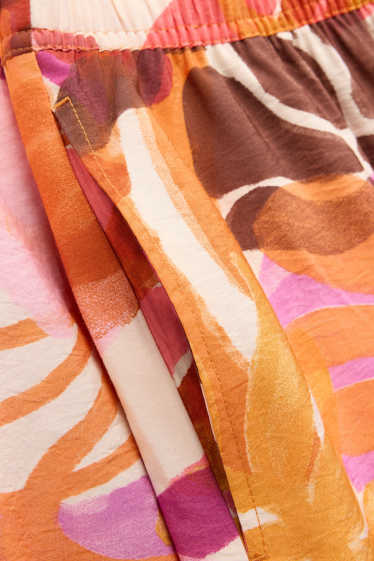 Women - Cloth trousers - high-rise waist - palazzo - patterned - orange / red