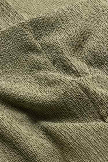 Dames - Flared legging - met structuur - groen