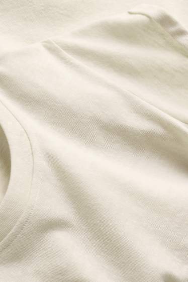 Dames - T-shirt - relaxed fit - crème wit