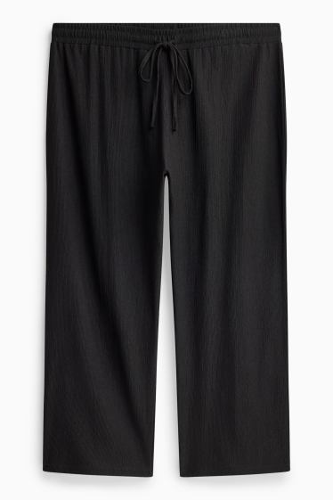 Dames - Jersey broek - mid waist - wide leg - met structuur - zwart