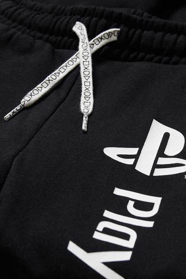 Kinderen: jongens - PlayStation - joggingbroek - zwart