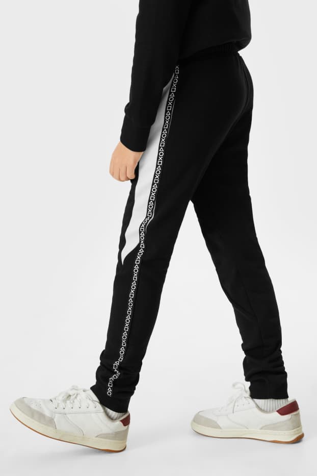 Kinderen: jongens - PlayStation - joggingbroek - zwart