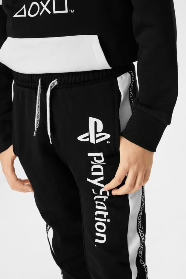 Kinderen: jongens - PlayStation - joggingbroek - zwart