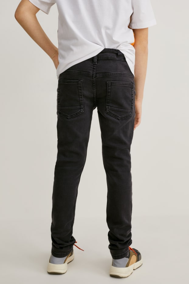 Kinder Buben - Skinny Jeans - schwarz