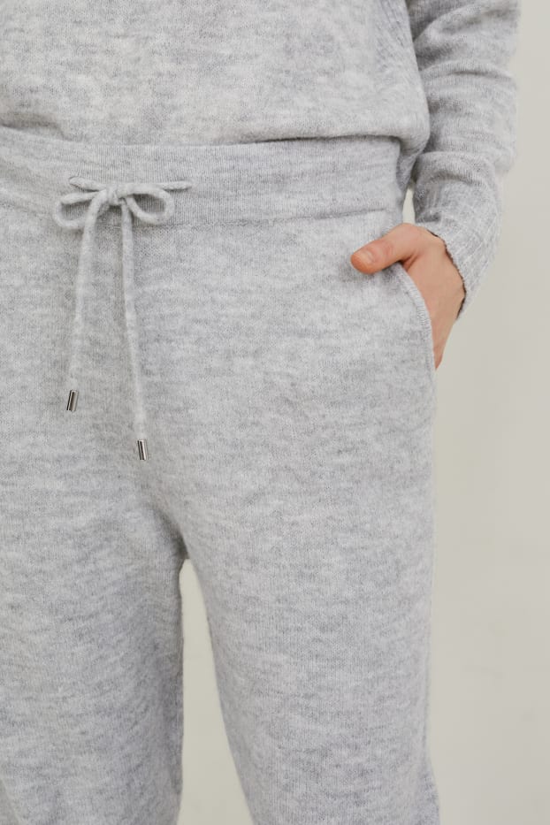 Women - Knitted trousers - light gray-melange