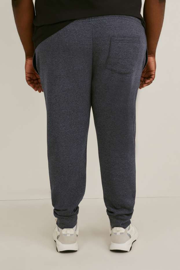 Uomo - Pantaloni sportivi - grigio melange