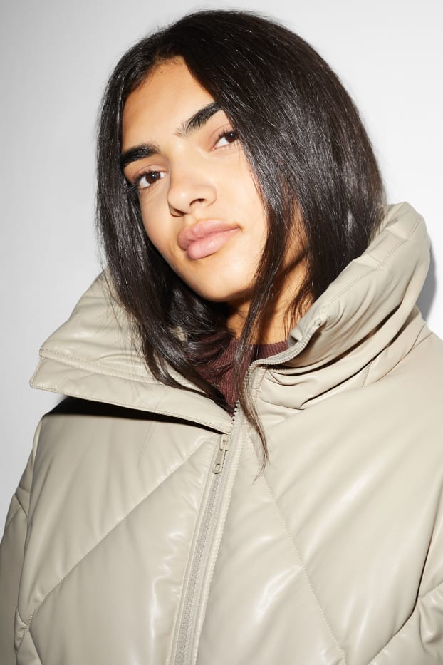 Dámské - Prošívaná bunda - imitace kůže - béžová-žíhaná