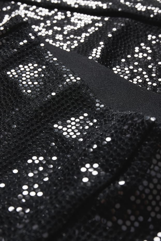 Dámské - Plátěné kalhoty - high waist - skinny fit - s třpytivým efektem - černá