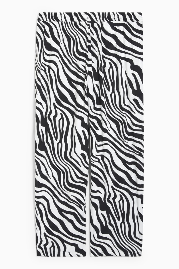 Femmes - Pantalon de toile - mid waist - wide leg - à motif - noir / blanc