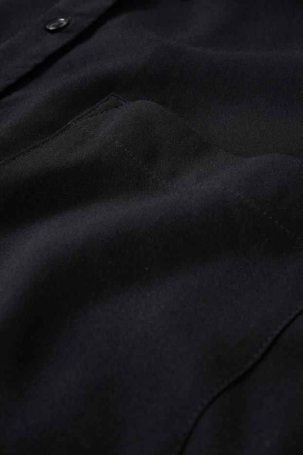 Dona - Brusa - negre