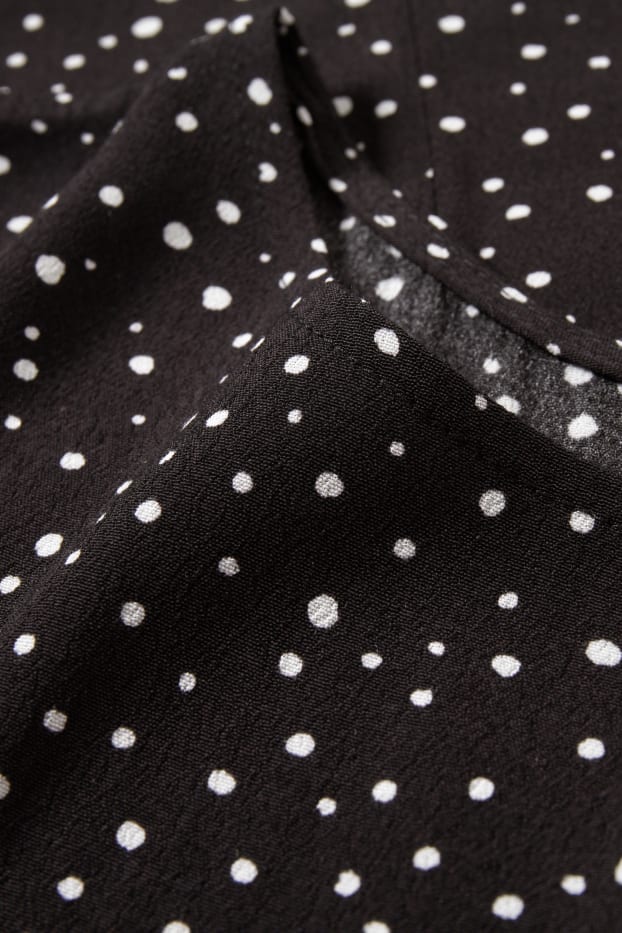 Damen - Bluse - gepunktet - schwarz