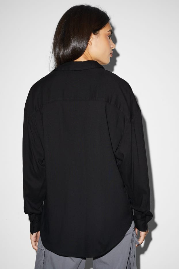 Dona - Brusa - negre