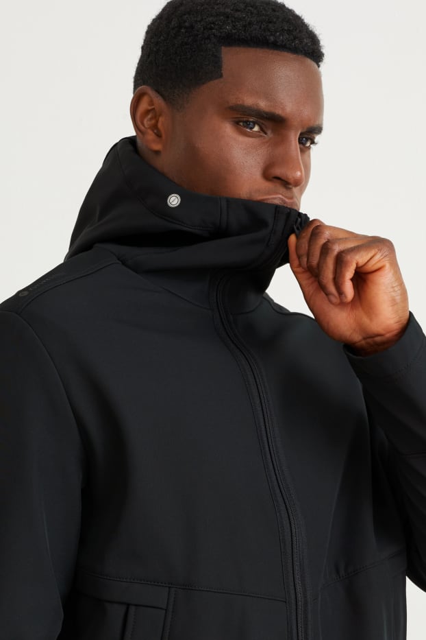 Hommes - Veste softshell à capuche - déperlante - 4 Way Stretch - noir