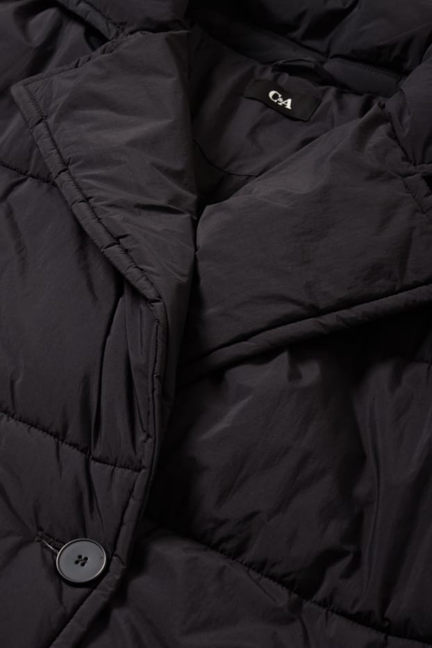 Dona - Abric embuatat - negre