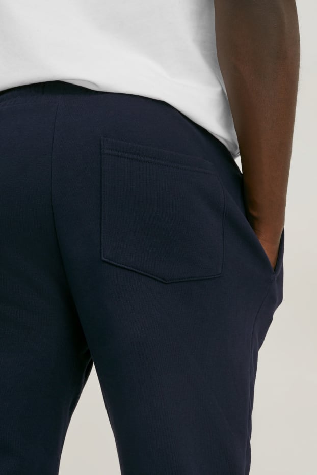 Hommes - Pantalon de jogging - bleu foncé