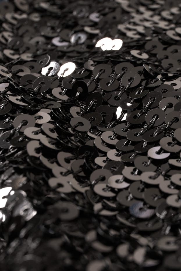 Femmes - Robe en sequins de forme évasée avec encolure en V - noir