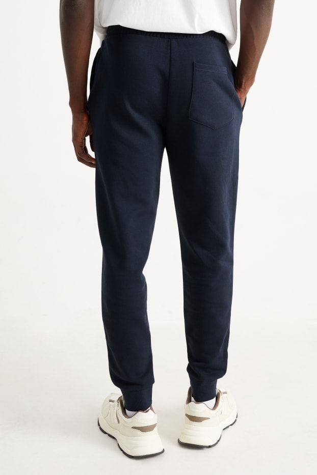 Hommes - Pantalon de jogging - bleu foncé