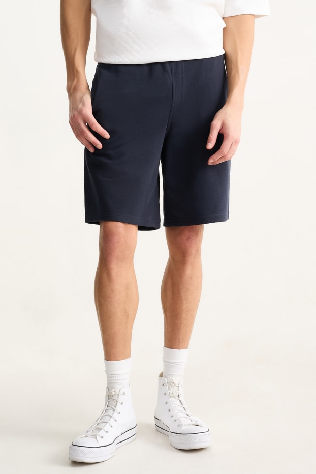 Uomo - Shorts in felpa - blu scuro