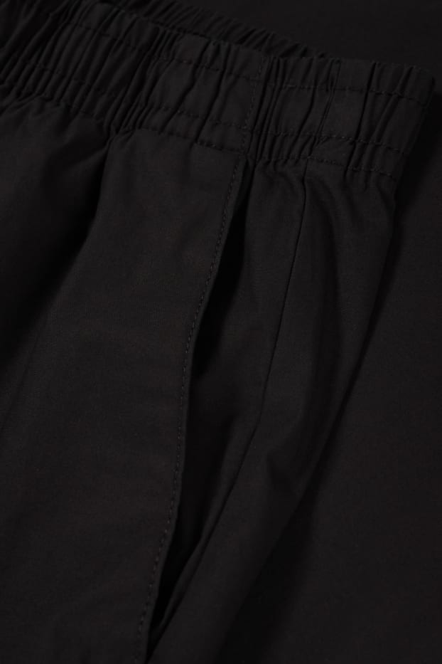 Pánské - Kalhoty chino - tapered fit - černá