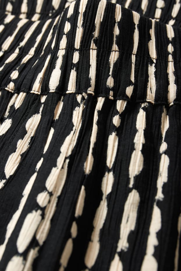 Mujer - Pantalón de tela - high waist - wide leg - estampado - negro