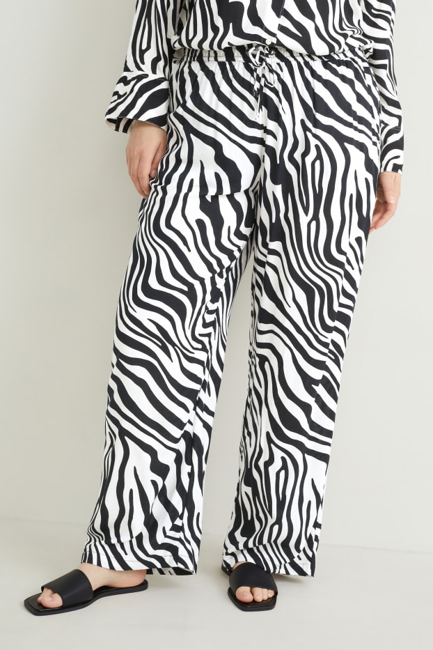 Femmes - Pantalon de toile - mid waist - wide leg - à motif - noir / blanc