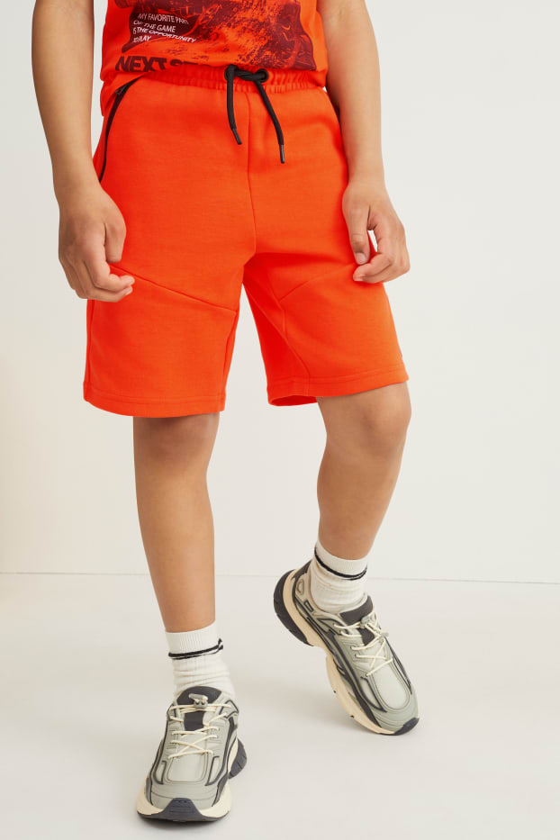 Nen - Bermudes de punt de dessuadora - taronja