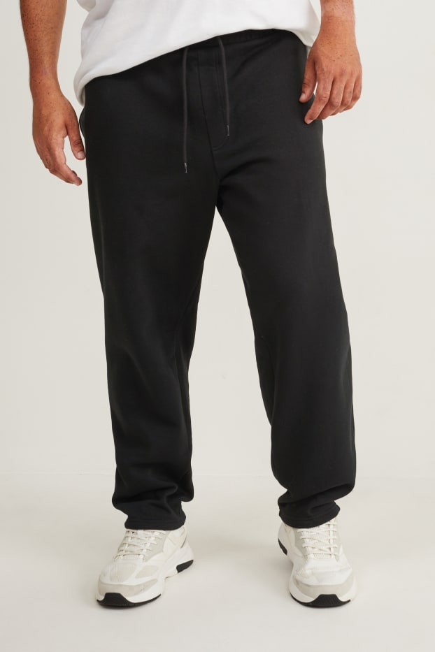 Bărbați - Pantaloni de trening - negru