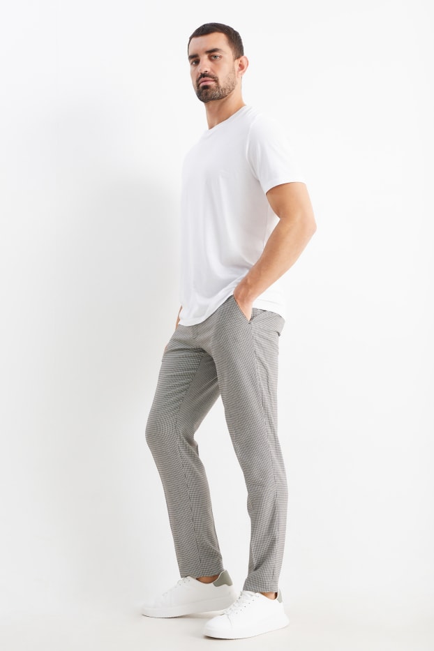 Uomo - Pantaloni coordinabili - regular fit - Flex - a quadretti - bianco / nero