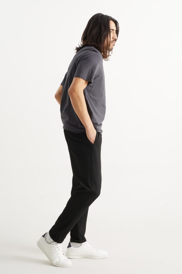Bărbați - Pantaloni de trening - negru