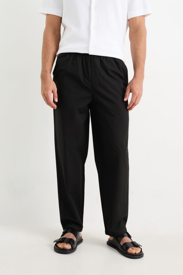 Pánské - Kalhoty chino - tapered fit - černá