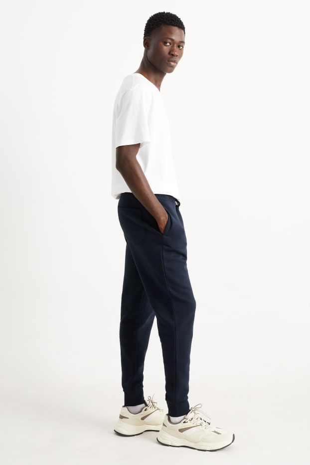 Hommes - Pantalon de jogging - bleu foncé