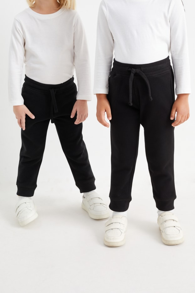 Děti - chlapci - Teplákové kalhoty - genderově neutrální - černá