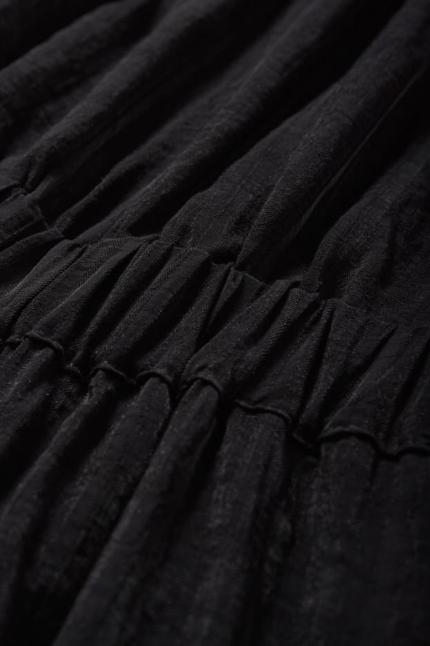 Dona - Vestit amb disseny d’una espatlla - negre