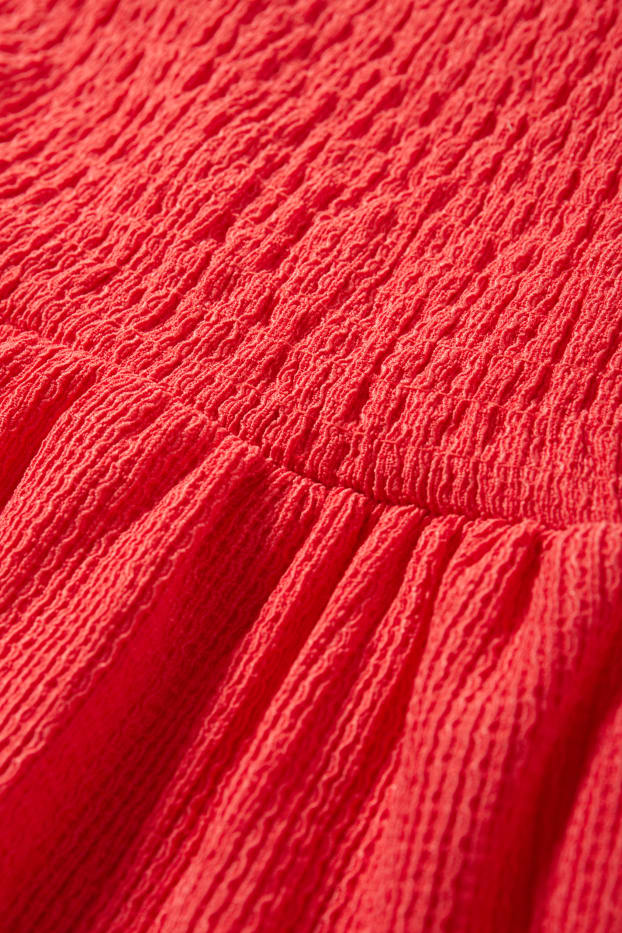 Dona - Samarreta sense mànigues - de punt de niu d'abella - vermell