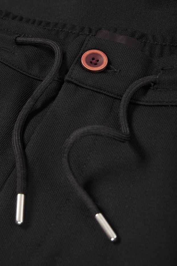 Bărbați - Chino - tapered fit - negru