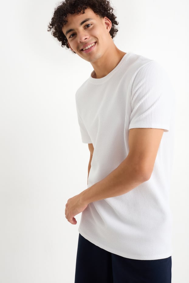 Uomo - T-shirt - tramata - bianco