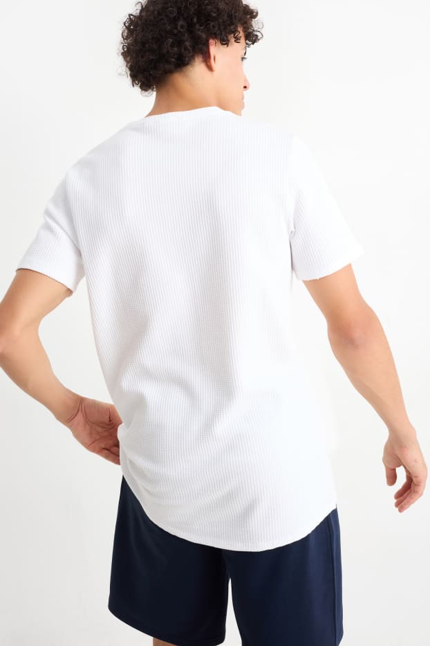 Uomo - T-shirt - tramata - bianco