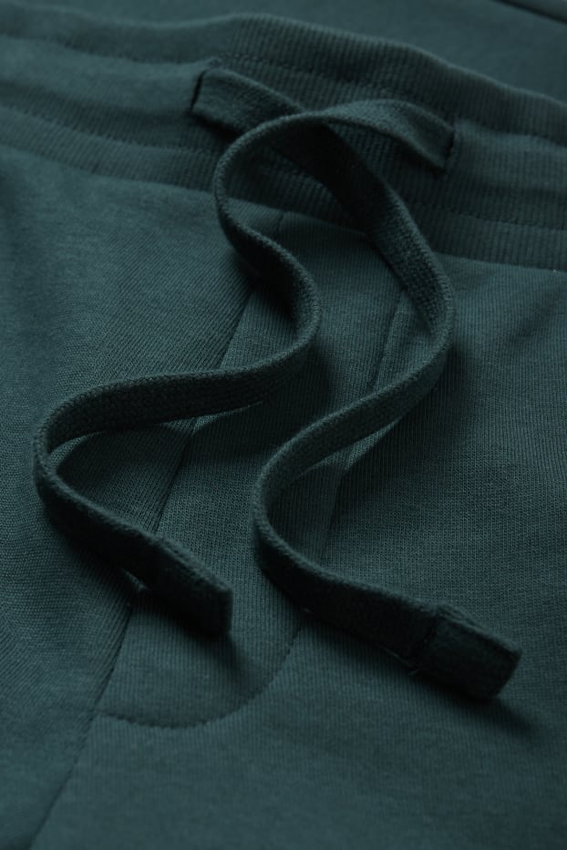 Hommes - Pantalon de jogging - vert foncé