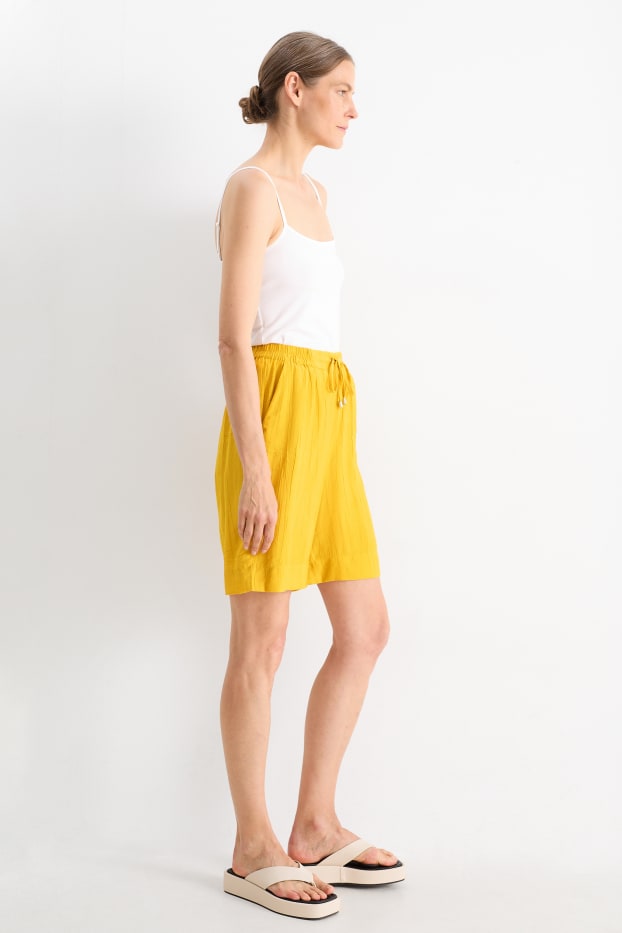 Women - Bermuda shorts - high waist - yellow