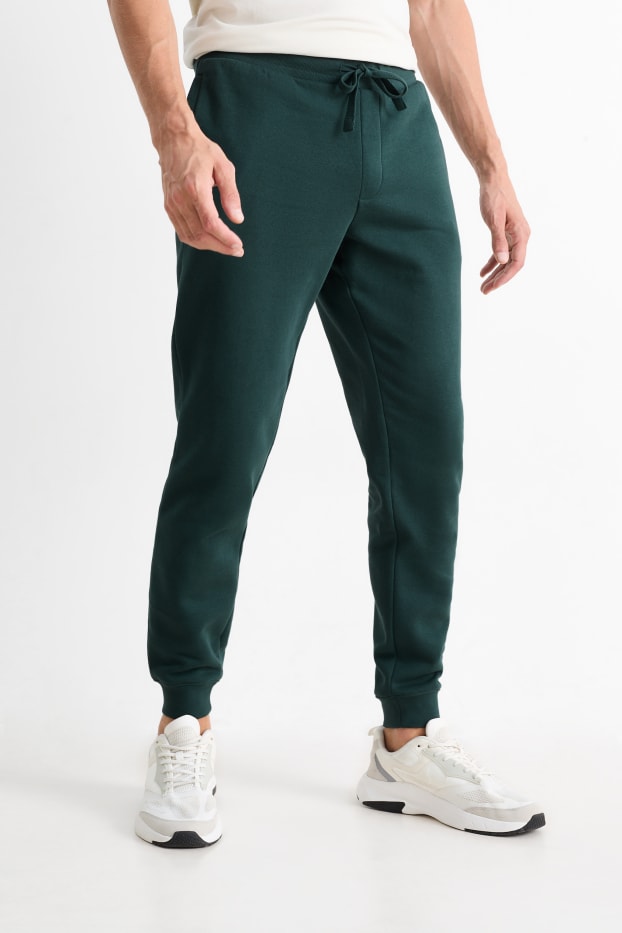 Hommes - Pantalon de jogging - vert foncé