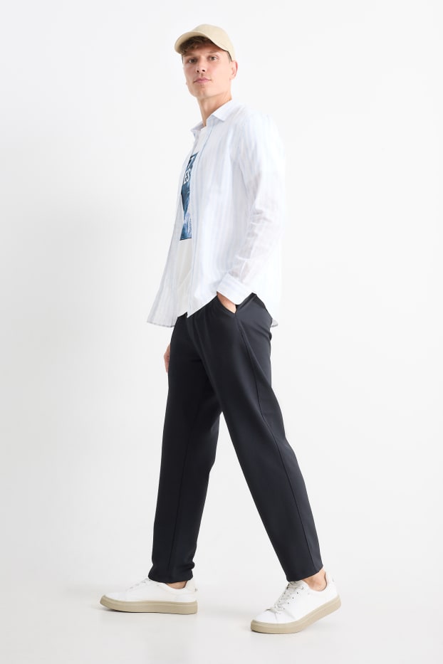 Home - Xinos - tapered fit - blau fosc