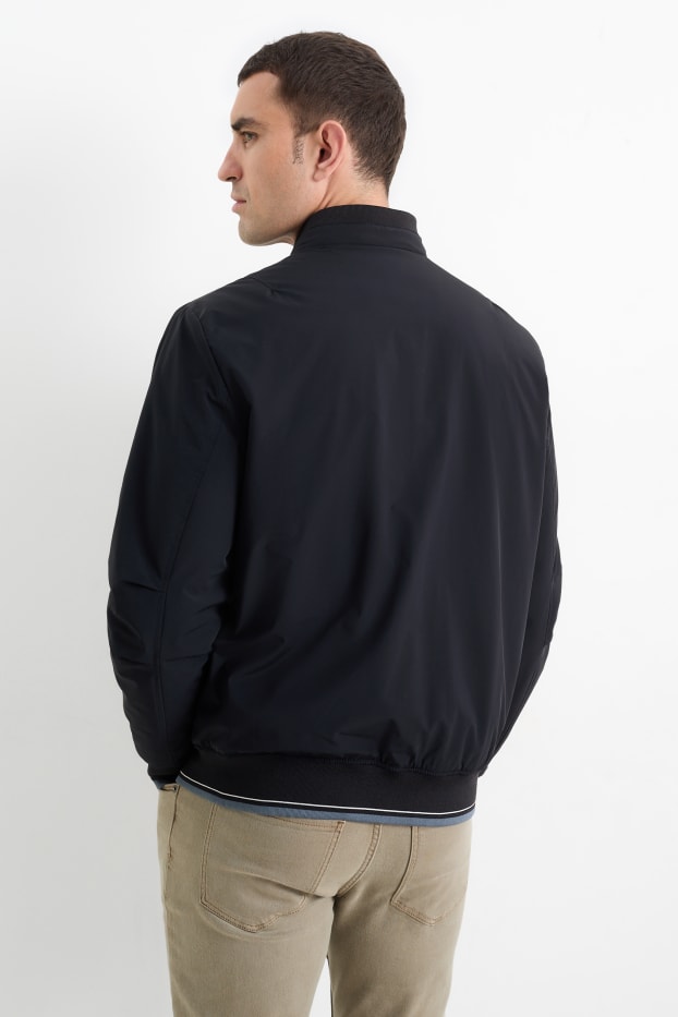 Home - Caçadora - impermeable - blau fosc
