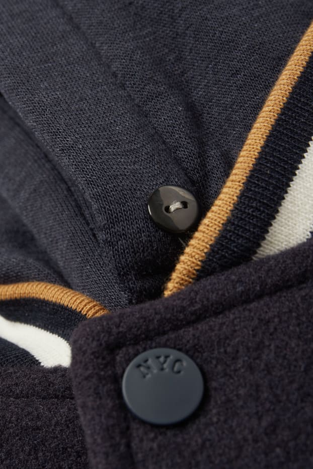 Kinderen: jongens - Fleece collegejas met capuchon - blauw / beige