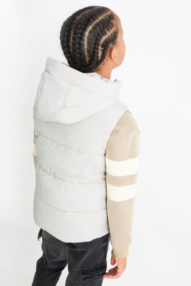 Kinderen: jongens - Bodywarmer met capuchon - waterafstotend - crème wit