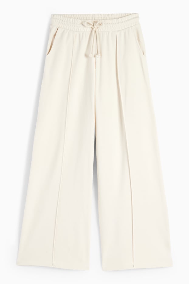 Dámské - Teplákové kalhoty - krémově bílá