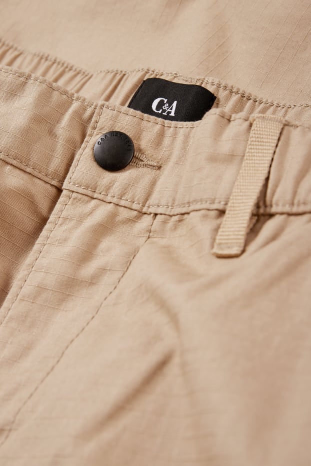 Mężczyźni - Spodnie spadochronowe - beżowy