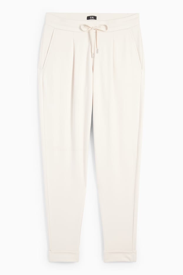 Femmes - Pantalon en jersey - mid waist - tapered fit - crème